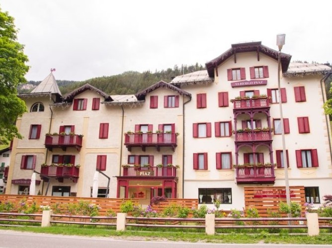 Hotel Piaz - Facade of the hotel in the typical style of Val di Fassa in Trentino Alto Adige