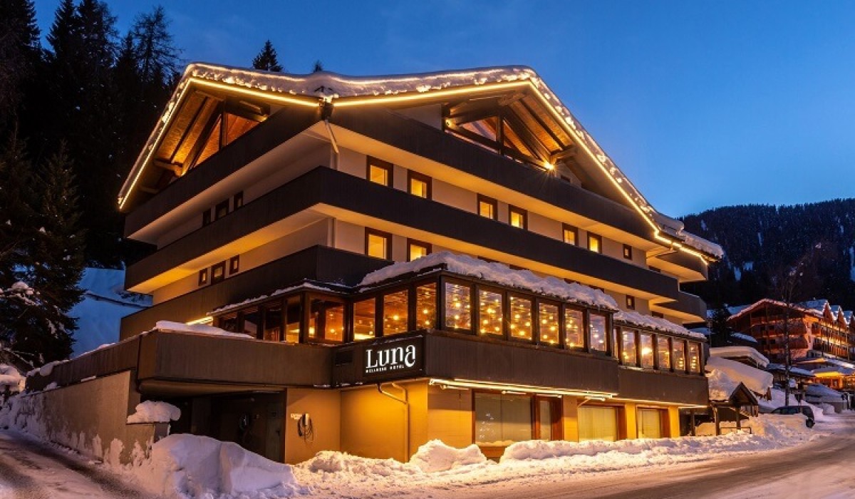 Luna Wellness Hotel - Surrounded by snow and glowing evening lights, Luna Wellness Hotel welcomes guests with warmth and elegance. A perfect retreat where relaxation meets Alpine charm.