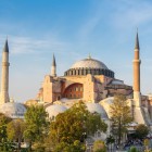 Exteriors of Hagia Sophia in Istanbul, with majestic domes, slender minarets, and historic façades showcasing centuries of Byzantine and Ottoman art.
