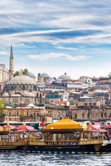 View of the Golden Horn in Istanbul highlighting the restaurants on traditional Turkish boats
