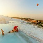 Bathing in the travertine thermal pools of Pamukkale in Turkey