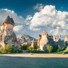 Mushroom-shaped formations of Aenaria in the canyon of Cavusin village in Cappadocia