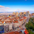 Bursa, the first Ottoman capital, captivates with historic mosques, lively markets, and natural landscapes, nestled between mountains and famous thermal springs in Turkey.