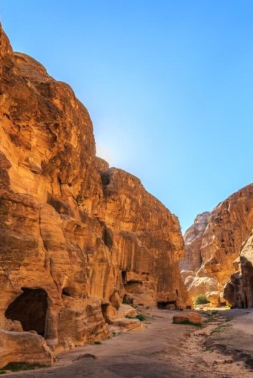 Caved buildings of Little Petra in Siq al-Barid, Wadi Musa, Jordan.