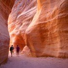 The Siq, the narrow slot canyon serving as the entrance passage to the hidden city of Petra, Jordan