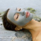 Natural outdoor spa with healing white clay mask from the Dead Sea
