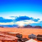Sunset in Wadi Rum, Jordan, known as "The Valley of the Moon," designated a UNESCO World Heritage Site.