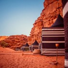 Overnight in Bedouin tents in Wadi Rum, a unique experience among stars, ancient traditions, and the silence of the red desert.