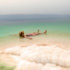 Relaxing bath in the waters of the Dead Sea in Jordan