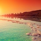 Spectacular sunrise on the shores of the Dead Sea in Jordan