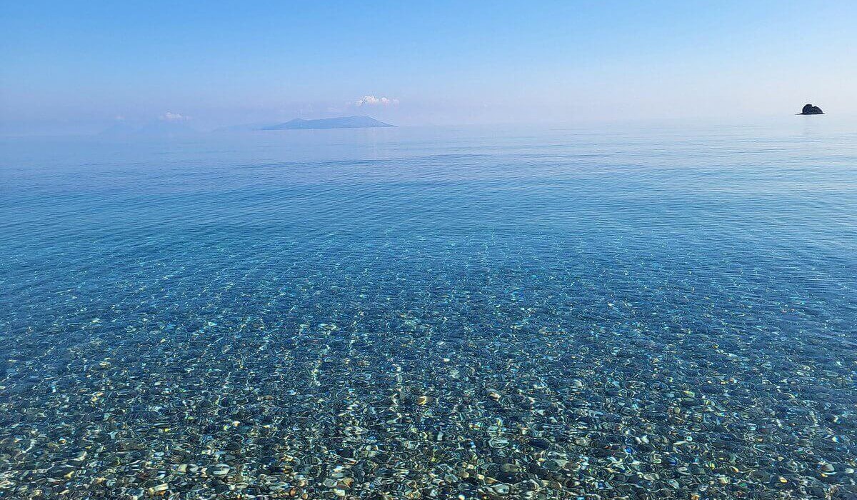 Hotel Club La Playa - Crystal-clear water fading into deep blue, light-colored sand, and the scent of the Sicilian sea filling the air.