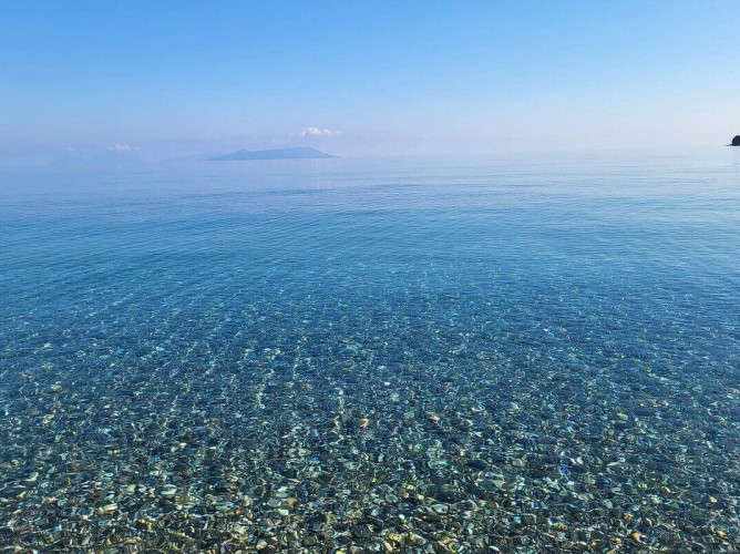 Hotel Club La Playa - Crystal-clear water fading into deep blue, light-colored sand, and the scent of the Sicilian sea filling the air.