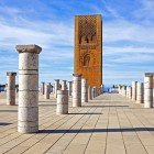 The Hassan Tower in Rabat, an unfinished 12th-century minaret, is a historic monument symbolizing the city and an example of Almohad architecture.
