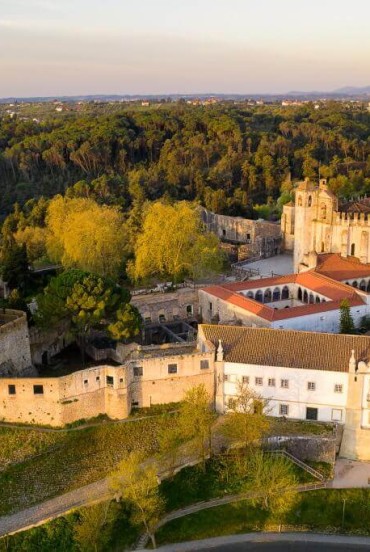Aerial view of the Convent of Christ and the Templar Castle (UNESCO World Heritage) built on an ancient Roman worship site, reflecting the long history of the West