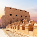 The Karnak Temple Complex (of which the Great Temple of Amun and the Temple of Luxor are only a part) is located on the east bank of the Nile, and its construction parallels the history of ancient Egypt