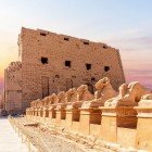 The Karnak Temple Complex (of which the Great Temple of Amun and the Temple of Luxor are only a part) is located on the east bank of the Nile, and its construction parallels the history of ancient Egypt