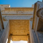 Details of the hieroglyphs on the entrance portal of the Temple of Edfu on the banks of the Nile between Esna and Aswan in Egypt