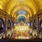 The Church of St. Stephen the Bulgarian, also known as the Iron Church, features stunning interiors with intricate woodwork, golden icons, and ornate chandeliers, blending Byzantine and neo-Gothic styles.