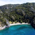 Aerial view of Kargicak Bay in Turkey, known for its crystal-clear waters and rich marine life.