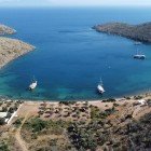 Gulet anchored in Molla Ibrahim Bay, Bodrum Peninsula, Muğla, Aegean Sea, Turkey.