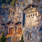 The Lycian tombs, carved into the rock along the Dalyan River, date back to ancient times. Situated on steep cliffs, they showcase majestic temple-like architecture that captivates visitors with their beauty and mysterious history.