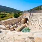 The Roman theatre of Patara, one of the largest in Lycia, still preserves its well-defined seating and stage. An archaeological gem that tells the story of the ancient city's cultural life.