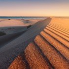 Patara boasts one of the most beautiful and enchanting beaches in Turkey. Surrounded by nature, its dunes and hills glow with golden light at sunset, creating an unforgettable landscape.