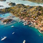 Simena, now known as Kaleköy, is an ancient Lycian village by the sea, famous for its medieval castle, Lycian tombs, and the sunken ruins visible in the crystal-clear waters of Kekova.