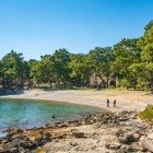 Phaselis Beach, with golden sand and turquoise waters, is a paradise corner. The ancient Roman ruins along the coast add a historical charm to this enchanting place.
