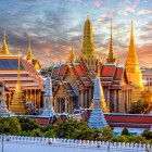View of the Grand Palace and Wat Phra Kaew temple at sunset, Bangkok, Thailand