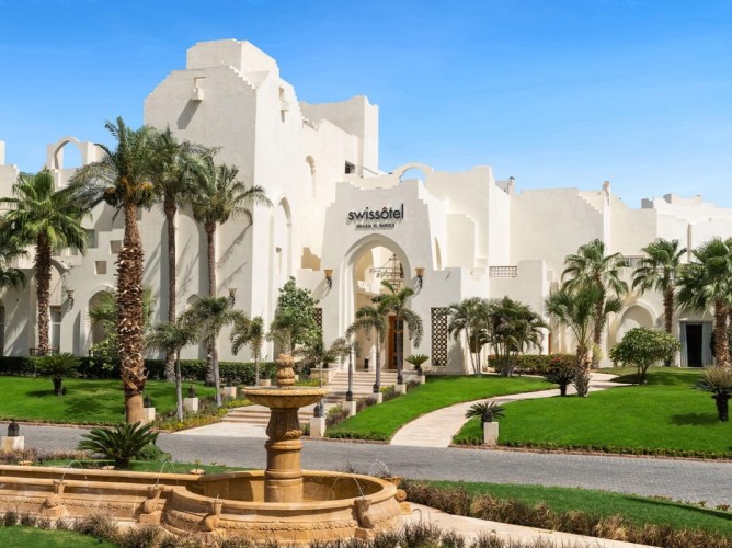 Swissôtel Sharm El Sheikh All Inclusive Collection - Swissôtel Sharm El Sheikh All Inclusive Collection is a modern multi-story resort featuring elegant design, spacious common areas, well-maintained gardens, and spectacular pools for an exclusive stay.