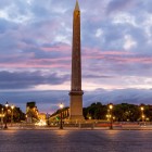 The obelisk of Place de la Concorde, an ancient Egyptian monument of pink granite, rises elegantly at the center of the Parisian square, a timeless symbol of history and splendor.