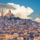Montmartre, Paris' bohemian district, enchants with cobbled streets, artists' studios, and the Basilica of Sacré-Cœur overlooking the city with spectacular views.
