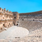 The large theater of Aspendos, dating back to around 162 AD, has exceptional acoustics and can accommodate up to 12,000 spectators