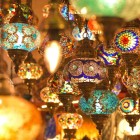 Handmade lanterns for sale at the Grand Bazaar in Istanbul, with colored glass and handcrafted details reflecting Ottoman tradition.