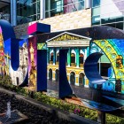 The name of Quito, displayed in large colorful letters at Mariscal Sucre International Airport, welcomes travelers with a vibrant greeting to the heart of Ecuador.