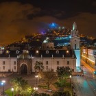 Night view of Quito with Plaza Grande, the cathedral’s white tower and Panecillo hill topped by the Virgin of Quito statue, Ecuador, South America