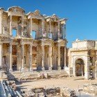 The Library of Celsus in Ephesus, built in the 2nd century AD, housed 12,000 scrolls and is a Roman masterpiece symbolizing ancient knowledge and culture.