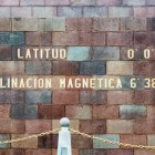 The Monument to the Equator in Quito, Ecuador marks 0° latitude, a symbolic landmark where the northern and southern hemispheres meet in a unique spot.