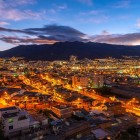 Quito’s skyline at sunset shines beneath the Pichincha volcano, blending city lights and nature into one of Ecuador’s most iconic and breathtaking views.