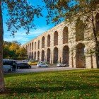 The Valens Aqueduct, a symbol of Byzantine engineering, stretches for over 900 meters in the center of Istanbul, connecting historic arches and urban landscapes.