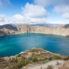 The crater of Quilotoa Volcano holds a 2 km emerald-green lake, surrounded by steep Andean walls that offer breathtaking and unforgettable views.