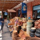 A typical shop in Lasso, Quito, Ecuador, showcases handcrafted terracotta and baskets woven from plant fibers, preserving the traditions and knowledge of Andean culture.