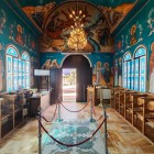 Colorful interiors of the Church of Saint John the Baptist in Bethany: vibrant Byzantine frescoes and millennia-old spirituality at the site of Jesus’ baptism.