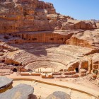 The Roman Theater of Petra, carved into the rock in the 1st century AD, combines Nabatean history and Roman architecture in a breathtaking setting.