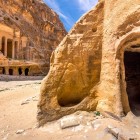 Little Petra, an ancient Nabatean center with buildings carved into the rock, holds history and mystery in the heart of the Jordanian desert.