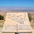 On Mount Nebo, a stone map indicates the biblical places visible from the summit: Jerusalem, Bethlehem, Jericho, and the Dead Sea-sites of the Holy Land.