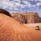 The 2-hour 4x4 desert safari in Wadi Rum crosses spectacular landscapes, passing natural arches, canyons, and historic Bedouin and Nabataean sites.