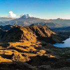 In the Cayambe Coca Reserve, the majestic Antisana volcano rises at twilight, dominating the eastern range of the Ecuadorian Andes with spectacular views.