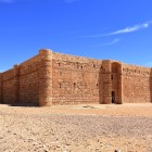 Qasr Kharana, an Umayyad castle in the Jordanian desert, amazes with its vaulted halls and 7th-century defensive architecture.